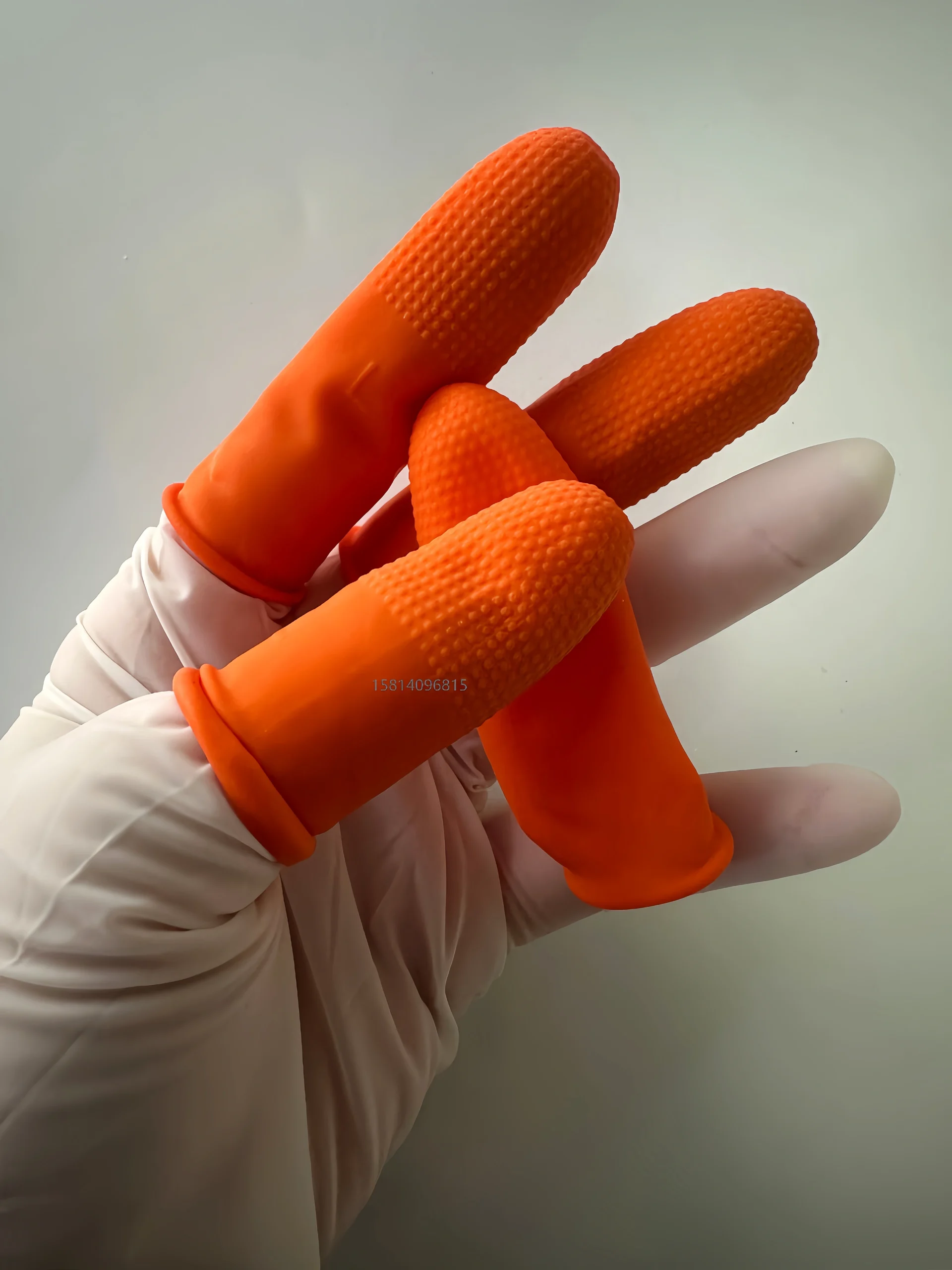 橙色加厚带点颗粒防滑手指套
